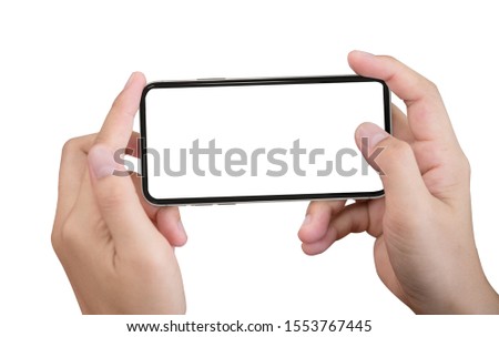 Smartphone in female hands taking photo isolated on white blackground Royalty-Free Stock Photo #1553767445