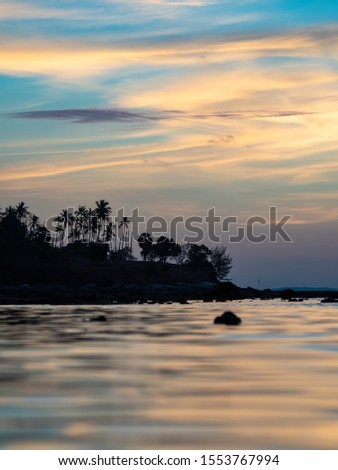 Beautiful Tropical beach at sunset at summer resort in Rawai Thailand