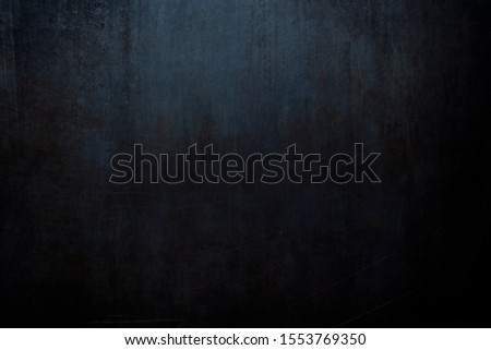 Old rusty dark blue metallic wall