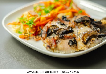 Chicken breast with sliced mushrooms, ham, in cheese sauce with pasta salad, diet food