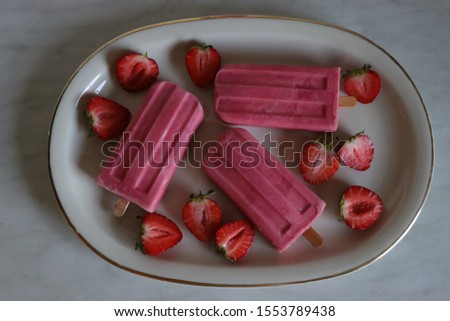 Tasty pink summer ice pops