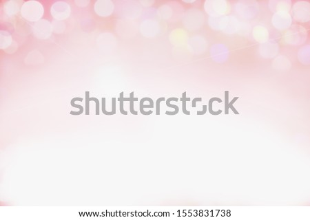 Beautiful pink bokeh blurred background perfect for Valentines Day or Wedding Invitations. Free space for text. 