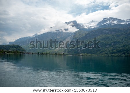 Beautiful scene of lake Brienz on cloudy sky and mountain background with copy space, Switzerland