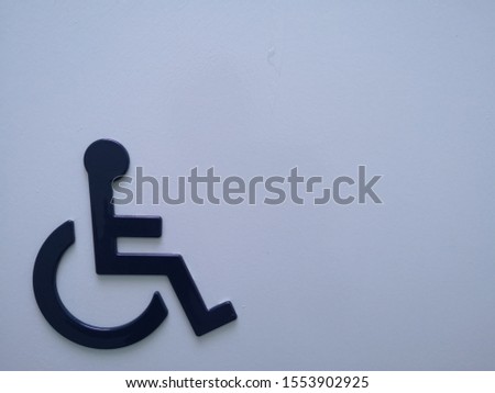 Disabled symbol raised signage background
