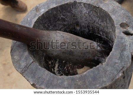 Black handmade wooden pounder to process manioc in a semiarid region, the interior of Piaui, Brazilian northeast