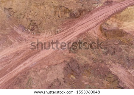 Aerial photography construction site dirt pavement texture abstract background top view