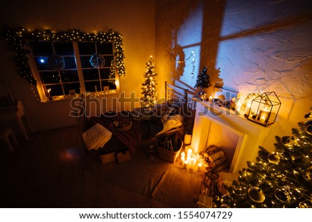 New Year 2020 interior with candles, bulbs and bokeh