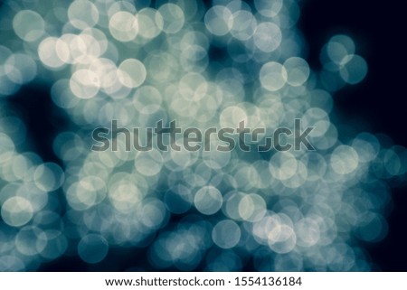 white color bokeh lens effect and black background