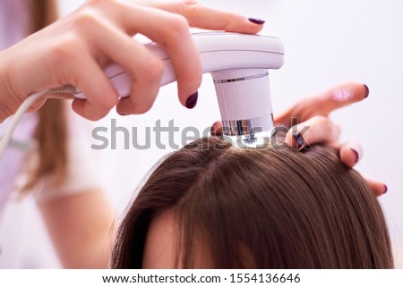 Diagnostic complex for microscopic examination of hair and skin of the scalp. Royalty-Free Stock Photo #1554136646