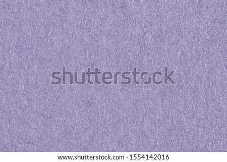 Purple paper with abstract texture for background. Paper for interior and exterior decoration or background for handcrafts. Purple paper background.