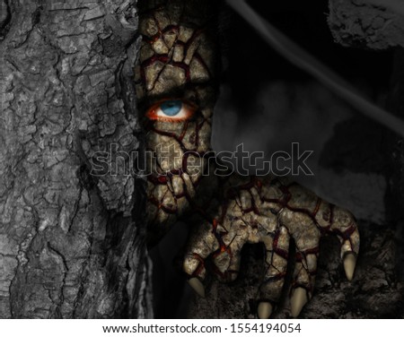 A human monster with lava cracks face is lurking behind a tree