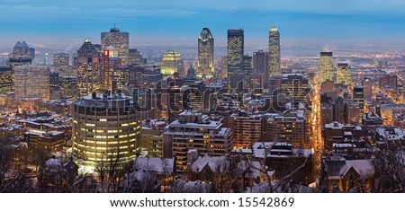 A high resolution panoramic view of downtown Montreal during winter as viewed from Mount Royal at dusk.