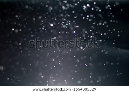 abstract blur or defocused lights bokeh on black background