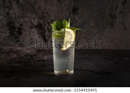 water with ice and lemon