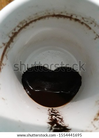 coffee grounds in love shaped glasses