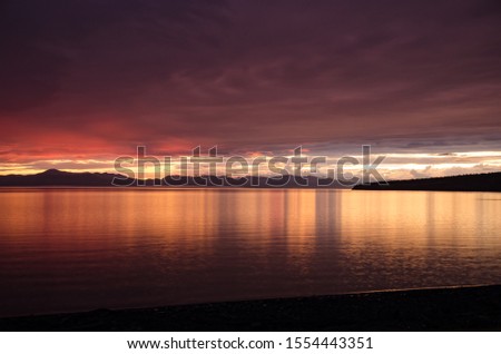 Rainy jrange red flamy sunset at Houbsougoul lake