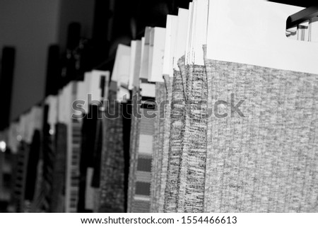 Black and white art photos of different fabric and satin designs