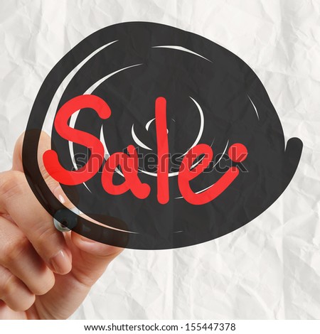 word sale with crumpled paper background as concept design