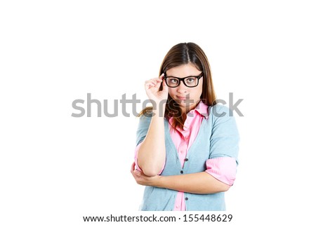 Closeup portrait of nerdy woman with glasses thinking with chin on hand, isolated on white background with copy space