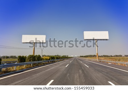 Blank billboard by the highway