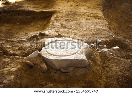 The excavation site of ancient objects, in the photo is a fragment of an ancient construction elements