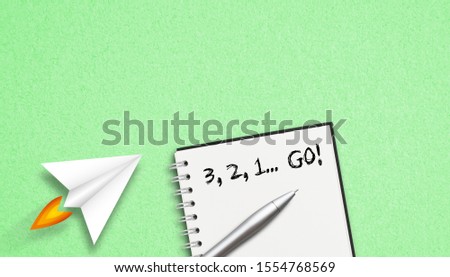 "3, 2, 1 Go" concept written on a notepad lying on paper background Royalty-Free Stock Photo #1554768569