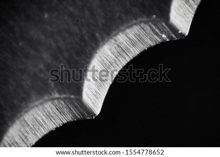 Closeup shoot of bread knife. Close up stainless bread knife Royalty-Free Stock Photo #1554778652