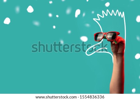 cartoon ostrich with a Mohawk in fashionable sunglasses on a mint background