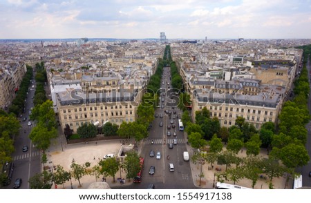 Panoramic view above the roofs of Paris, France, shot from the top of Arc de Triomphe : Mac-Mahon Avenue, up to Porte de Champerret, Wagram Avenue, heading to Porte de Clichy, and Hoche Avenue