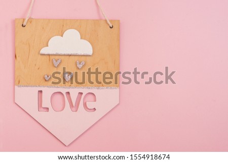 love signboard on pink background with place for text for valentines day