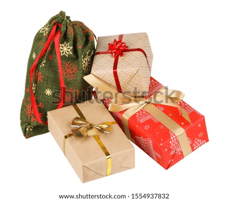 Three boxes and a bag. Christmas wrapping. Isolated picture.