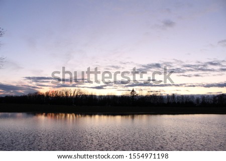 Landscape in the early spring. Sunset