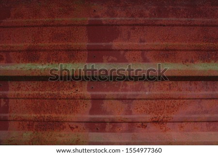 weathered texture of red tin sheet