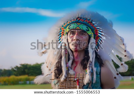 native Americans.portrait of Americans Indian man. Royalty-Free Stock Photo #1555006553