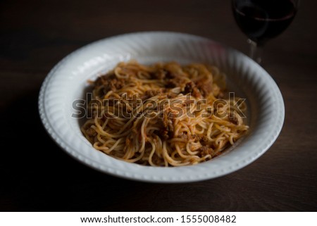 Pasta lover with red wine