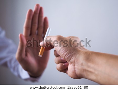 The hand rejected the cigarette that was handed over. Smoking Concepts Causes of Lung Cancer. Just say no