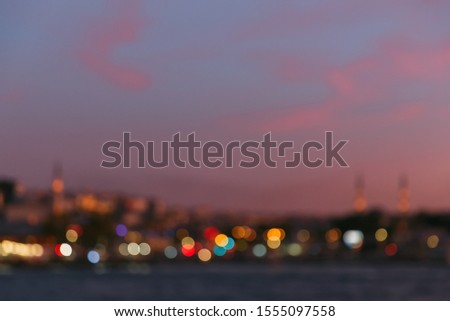Night bokeh light in big city, blurred cityscape view, abstract light defocused background.