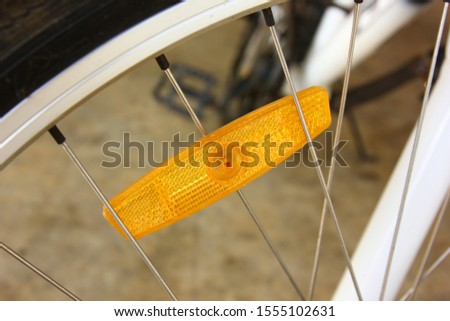 bicycle reflex accessory for safety ride on road. Royalty-Free Stock Photo #1555102631
