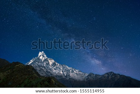 beautiful night view of Mount Fishtail and Milky Way from Mardi trek, Kaski, Nepal.