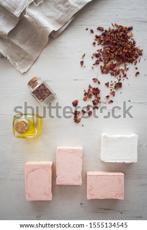 Still life of natural soaps and essential oils. Concept of natural cosmetics.