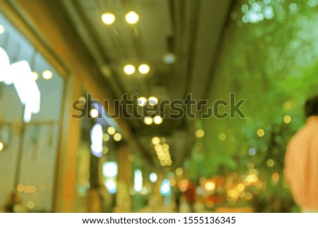 Abstract blur image of Shopping mall with bokeh for background usage . 