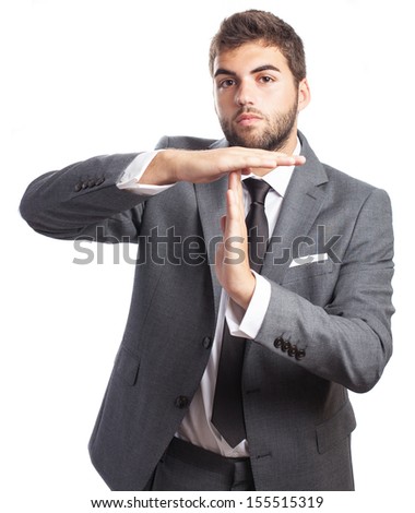 business man doing break symbol on a white background