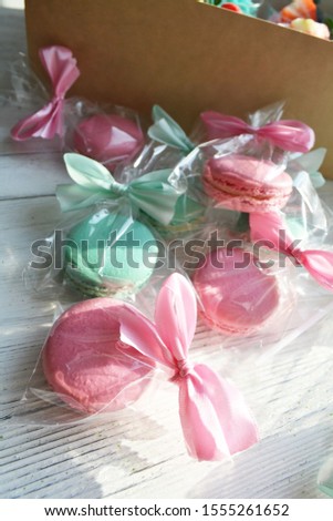 blue and pink macaroons in bags
