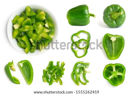 Set of fresh whole and sliced green bell pepper isolated on white background. Top view. Royalty-Free Stock Photo #1555262459
