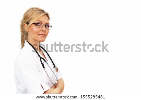 Young blond female doctor on white background