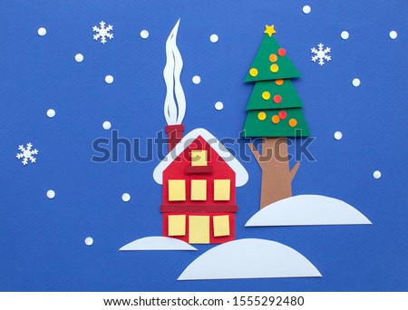 Paper art, cut, handmade 3d illustration. Red paper house with yellow window. Winter nature landscape. House on bank under snow. Countryside rural scene. Cartoon outdoors Illustration. Blue background