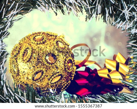 Fir tree decoration. Light background. New Year mood, Christmas tree toys. Lights, bokeh or Abstract Blurred Christmas Lights desktop, postcards, wallpaper. Copy space for design. 