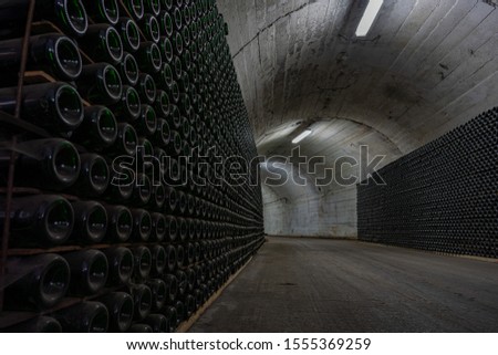Tunnels filled with champagne bottles in winery of Prince Galitzine in Novyi Svit of Crimea, Travel during Summer