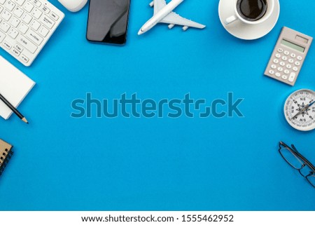 Office desk table of Business workplace and business objects on blue background Copy space for text.