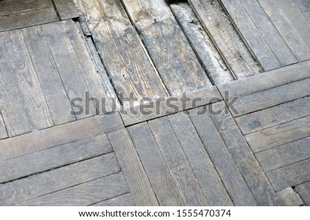 Seamless tiles Fragment of old wooden parquet floor
